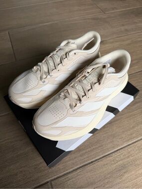 Adidas ADIZERO EVO SL EXO SUEDE
LIGHTSTRIKEPRO RUNNING SHOES